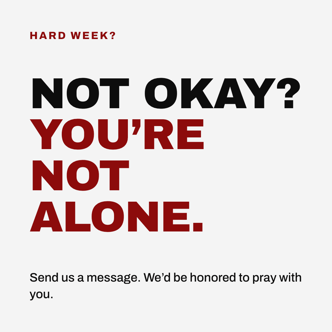Graphic reading "Not okay? You're not alone." Label: Hard week? Send us a message. We'd be honored to pray with you.